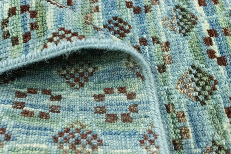 Wollen tapijt - 92 x 63 cm - lichtblauw