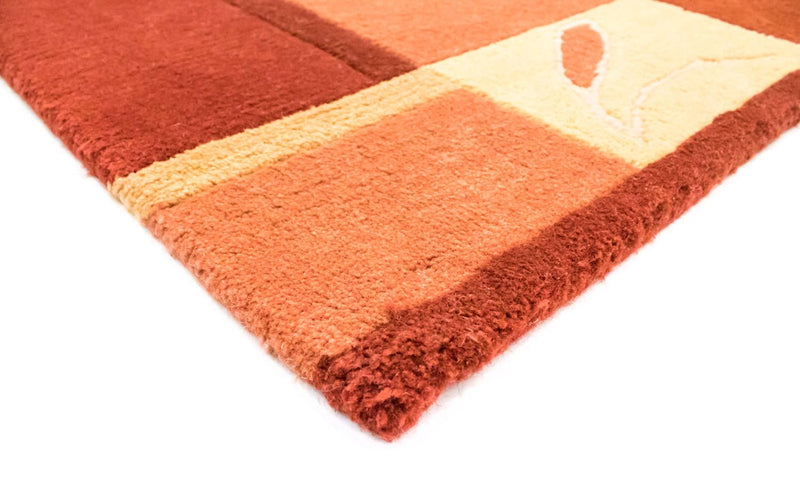 Nepal tapijt - 238 x 170 cm - oranje